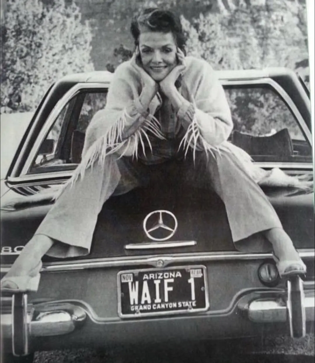 Jane Russell at her home in Arizona, with her 1969 Mercedes 280SL.webp
