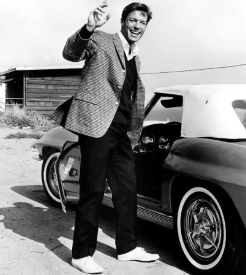 Richard Chamberlain and his 1963 Chevrolet Corvette.webp